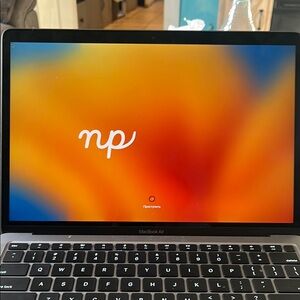 Apple Silver Laptop with Modern Slim Design and Vibrant Display